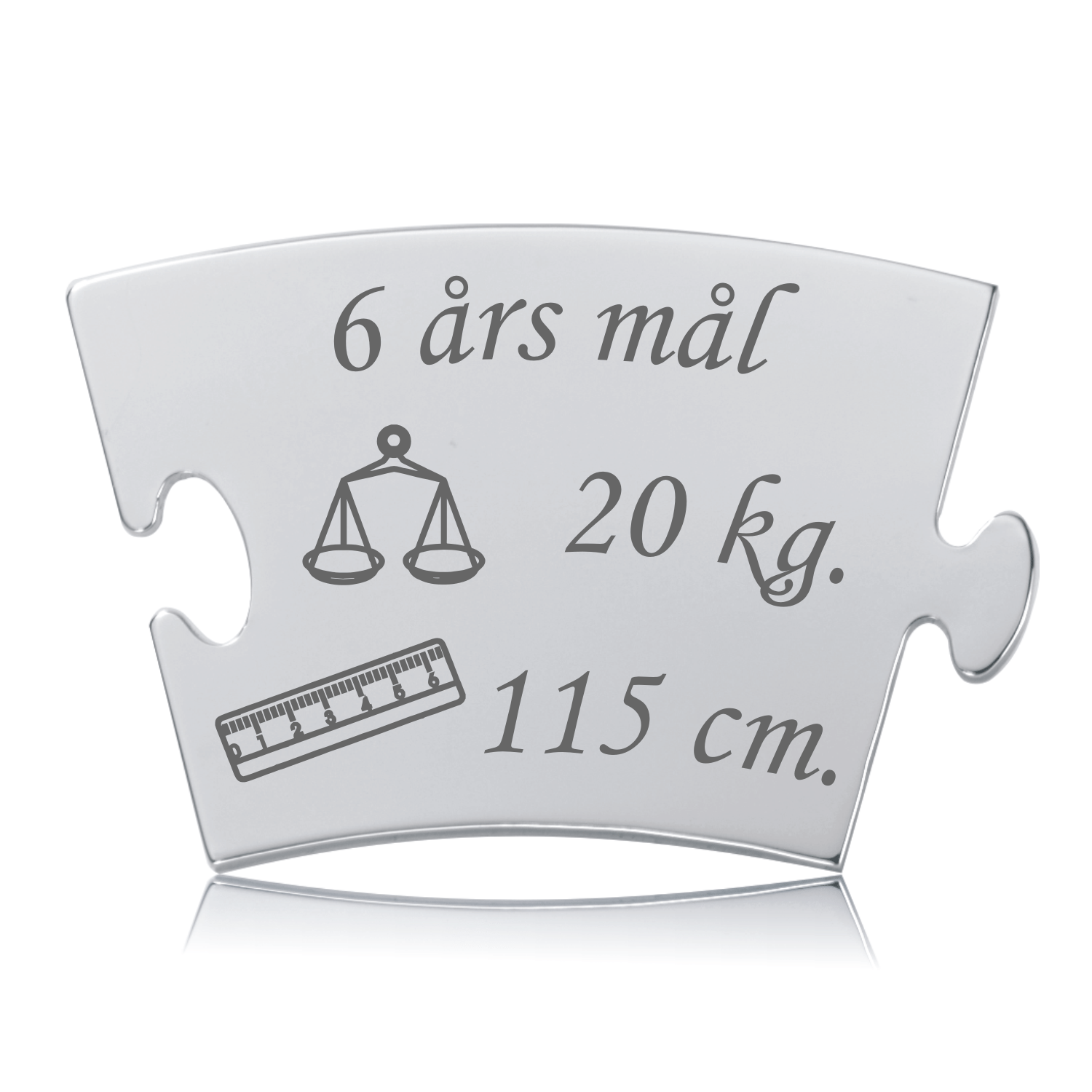 Memozz Classic "6 års mål" brik i poleret rustfrit stål med lasergravering. Brikken viser teksten "6 års mål", en vægt og en lineal.