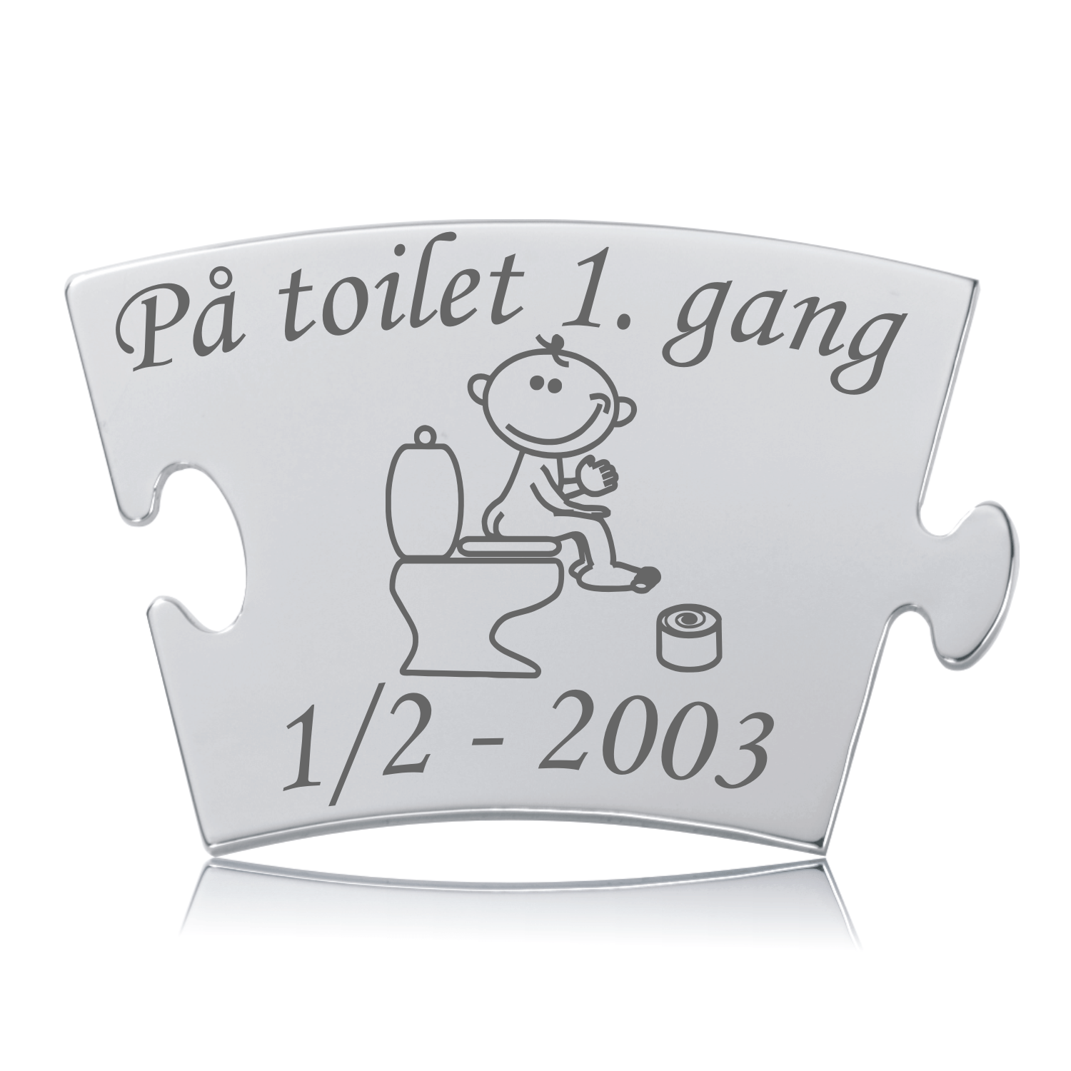 Memozz Classic brik "På toilet 1. gang" i blankt rustfrit stål med mørk lasergravering af barn på toilet.
