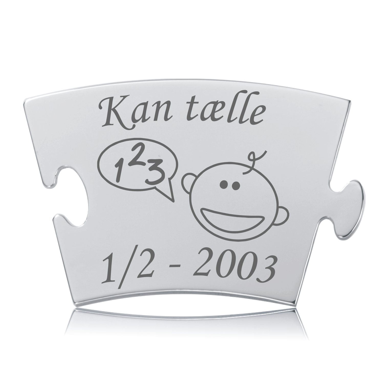 Memozz Classic "Kan tælle" mindebrik i håndpoleret rustfrit stål med gravering af smilende ansigt og talboblen "1 2 3".