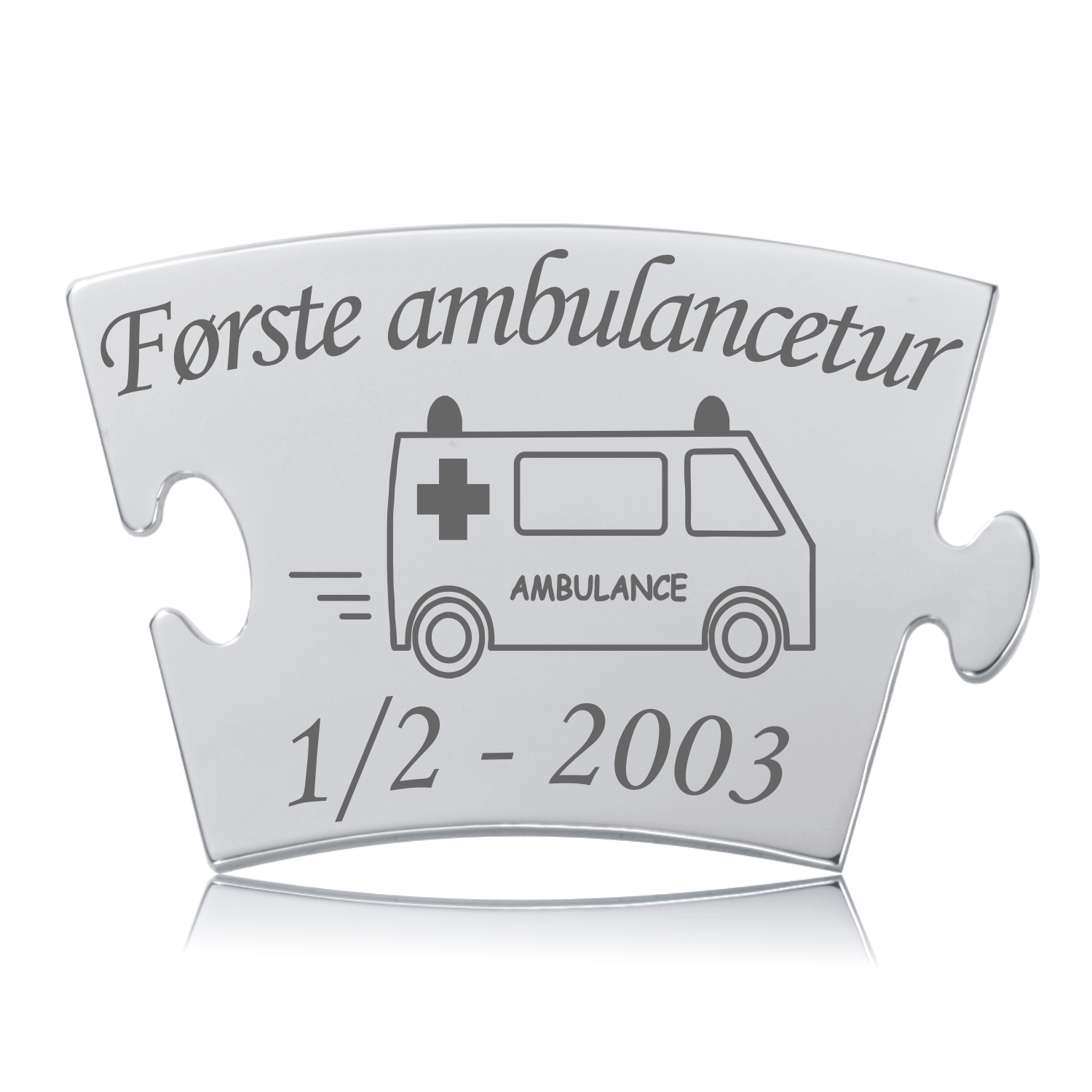Memozz Classic brik "Første ambulancetur" med illustration af ambulance på graveret rustfrit stål