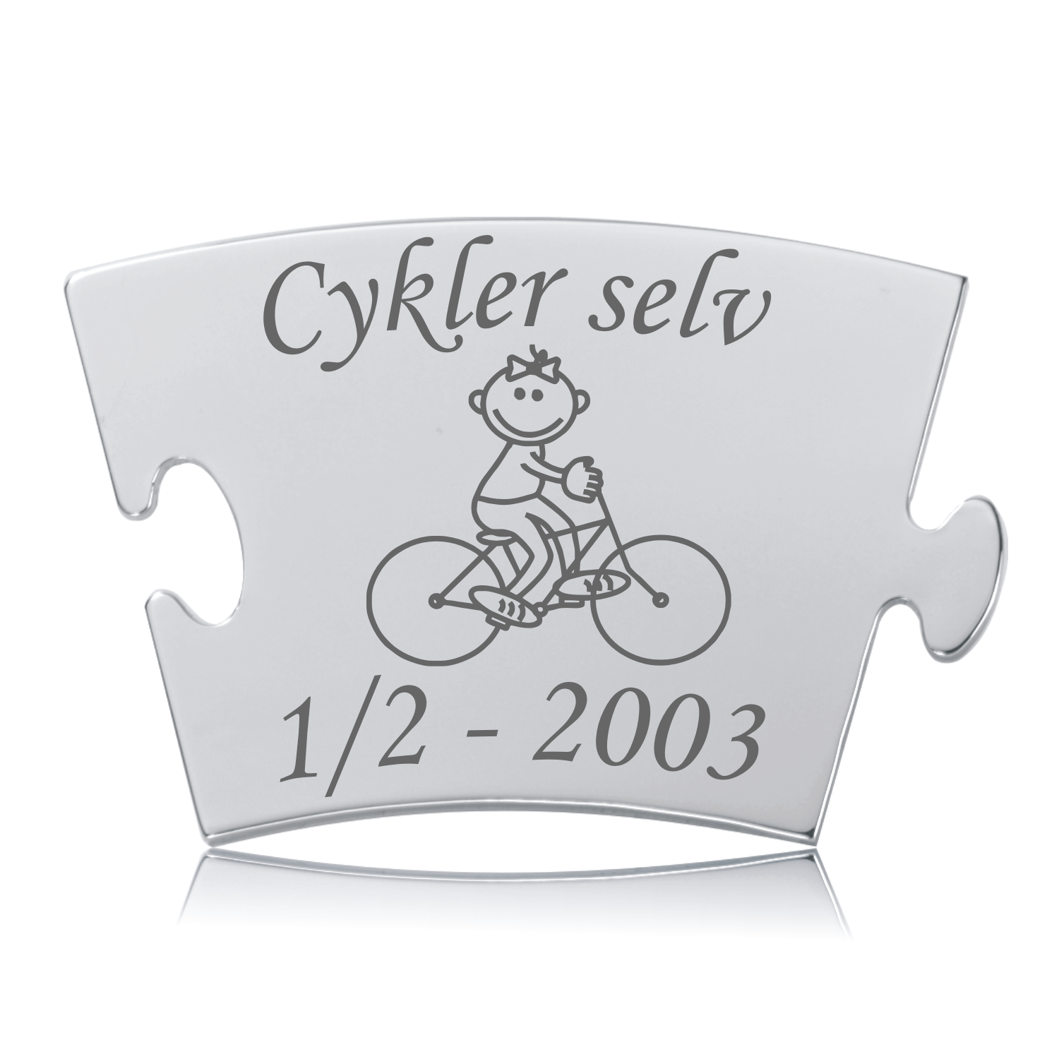 Cykler selv - Pige Memozz Classic Brik Memozz Classic brik "Cykler selv - Pige" i poleret rustfrit stål med graveret illustration af en pige på cykel.