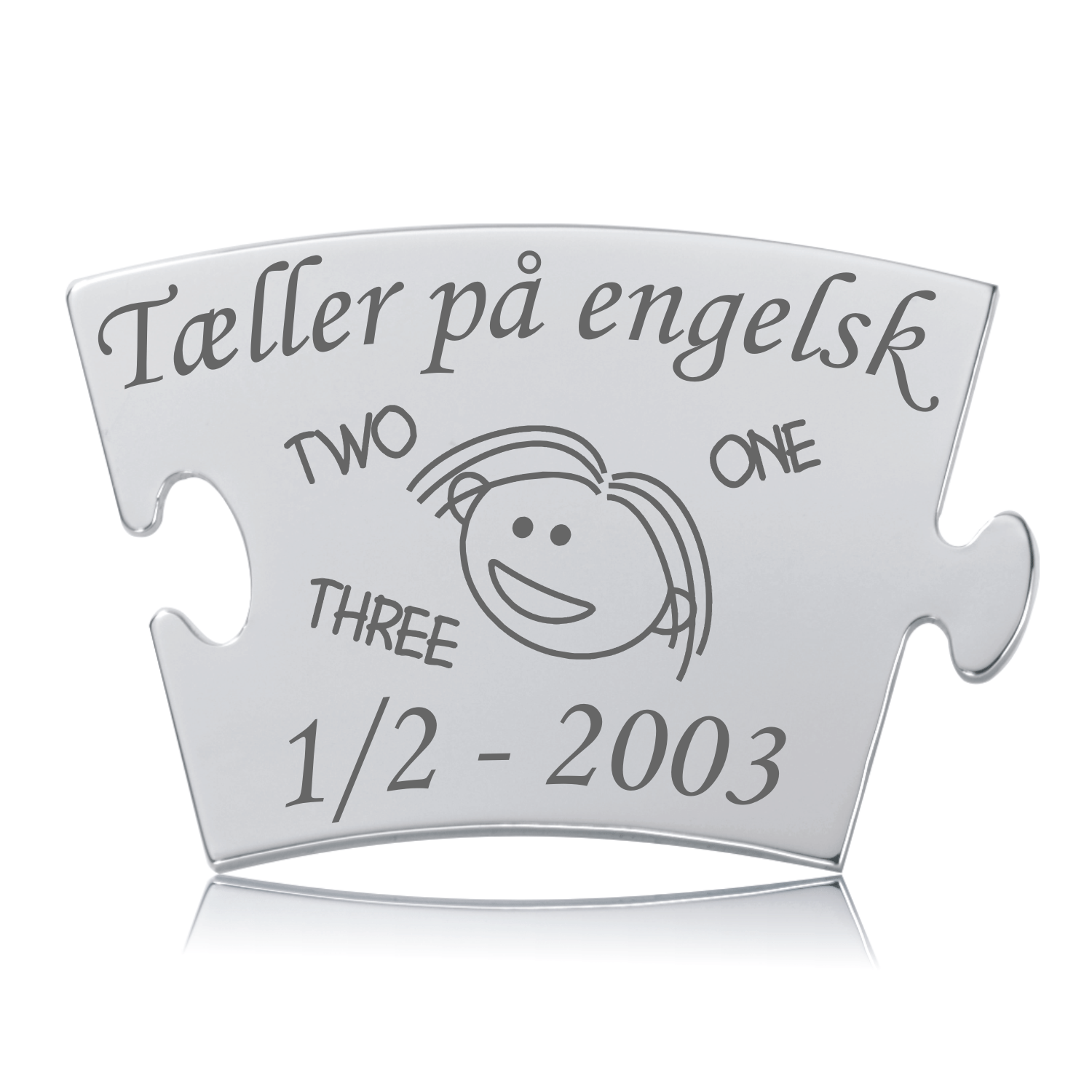 Memozz Classic brik "Tæller på engelsk - Pige" i blankt stål med mørk lasergravering showing "Tæller på engelsk" og "ONE, TWO, THREE".