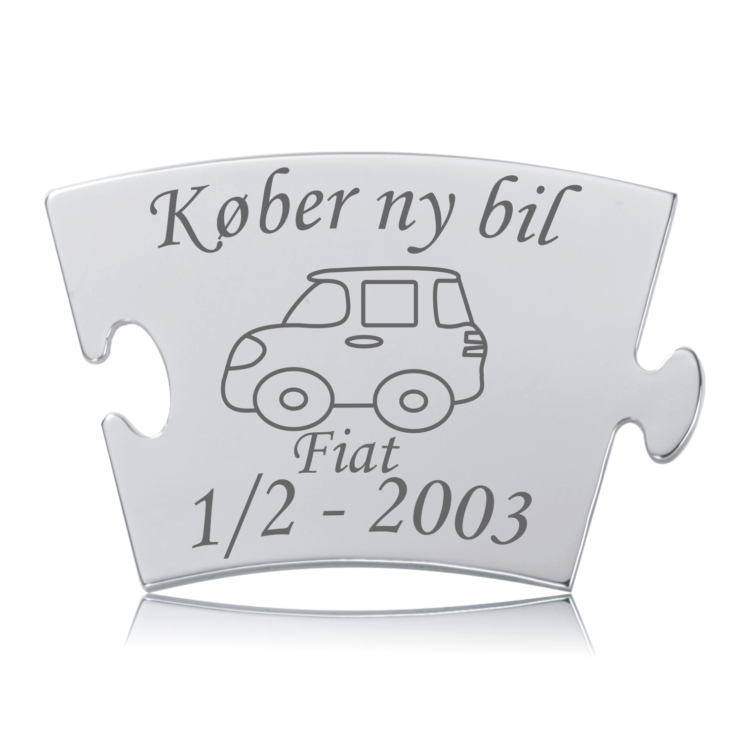 Memozz Classic brik i rustfrit stål med gravering af en bil og teksten "Køber ny bil"