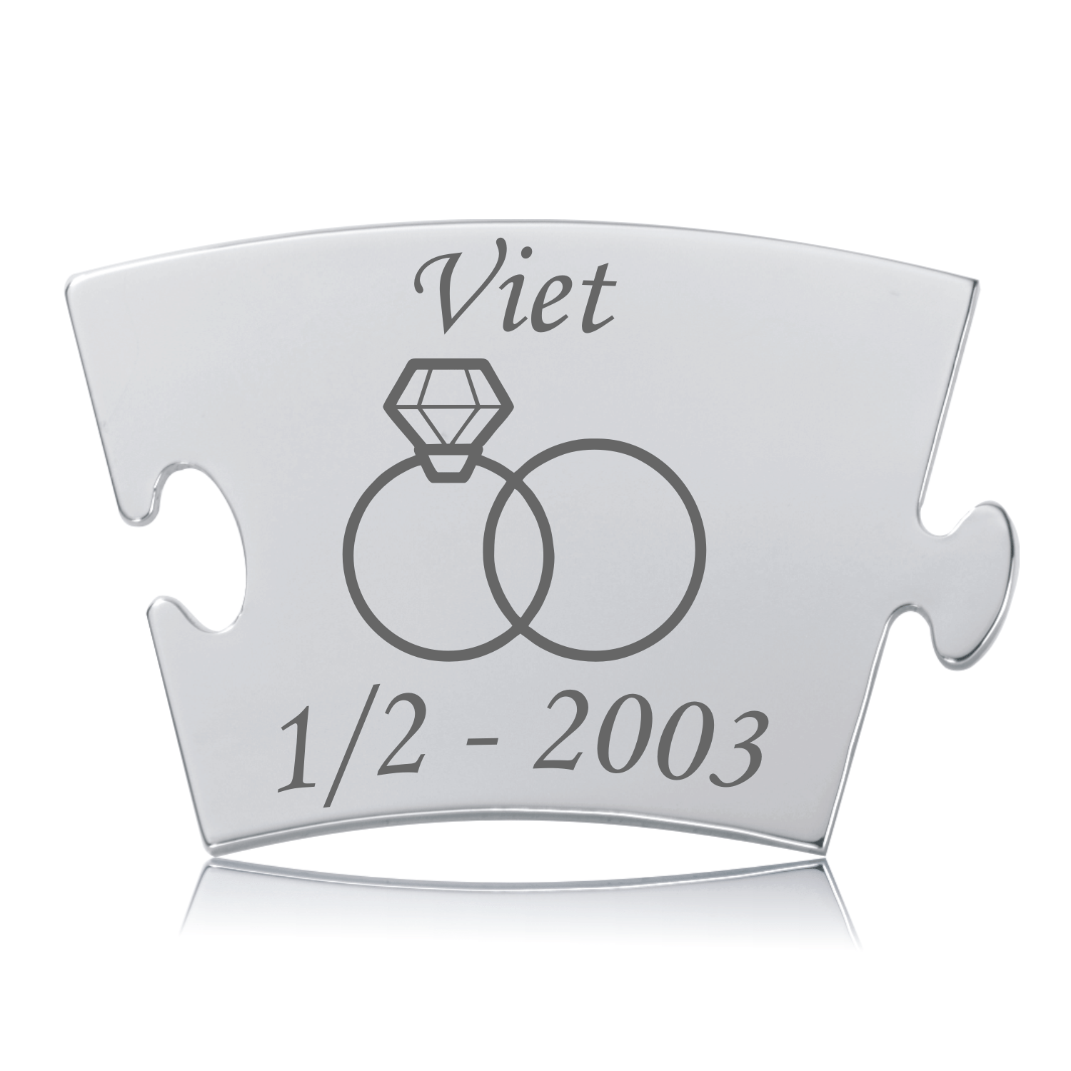 Memozz Classic brik "Viet - Model Ringe" i poleret rustfrit stål. Viser to sammenflettede ringe og teksten "Viet".