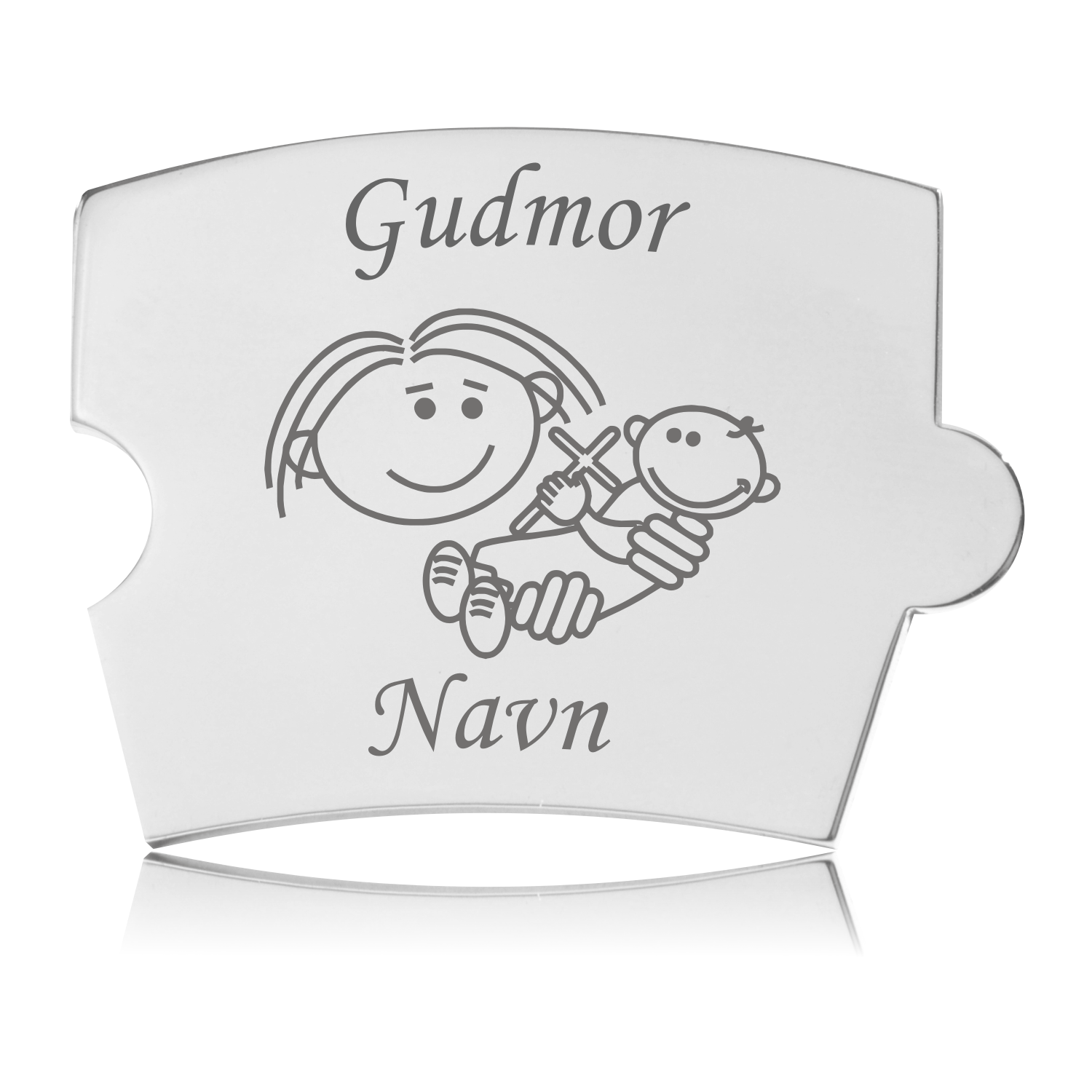 Memozz Spin Gudmor brik i håndpoleret stål med gravering af figur der holder baby. Til mindetavle.