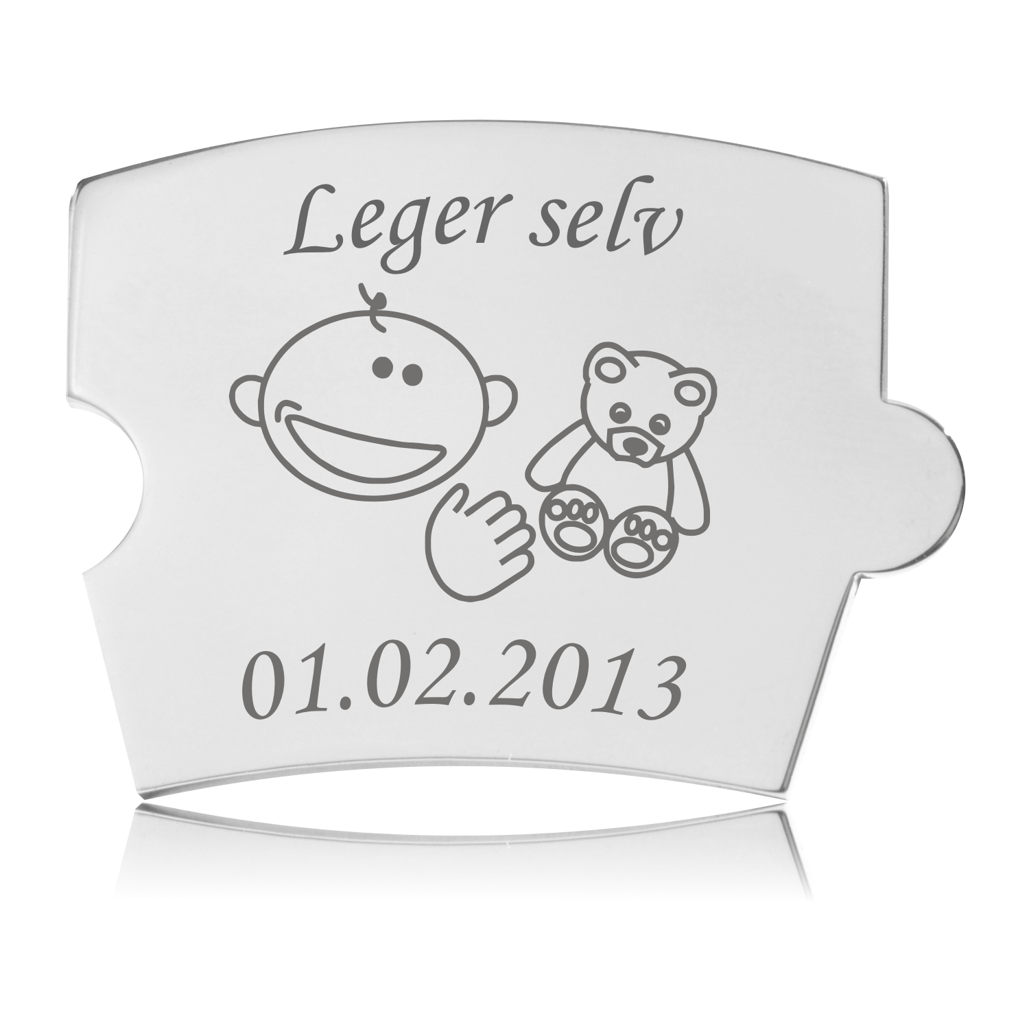 Memozz Spin mindebrik "Leger selv" med et smilende barneansigt og bamse graveret i rustfrit stål