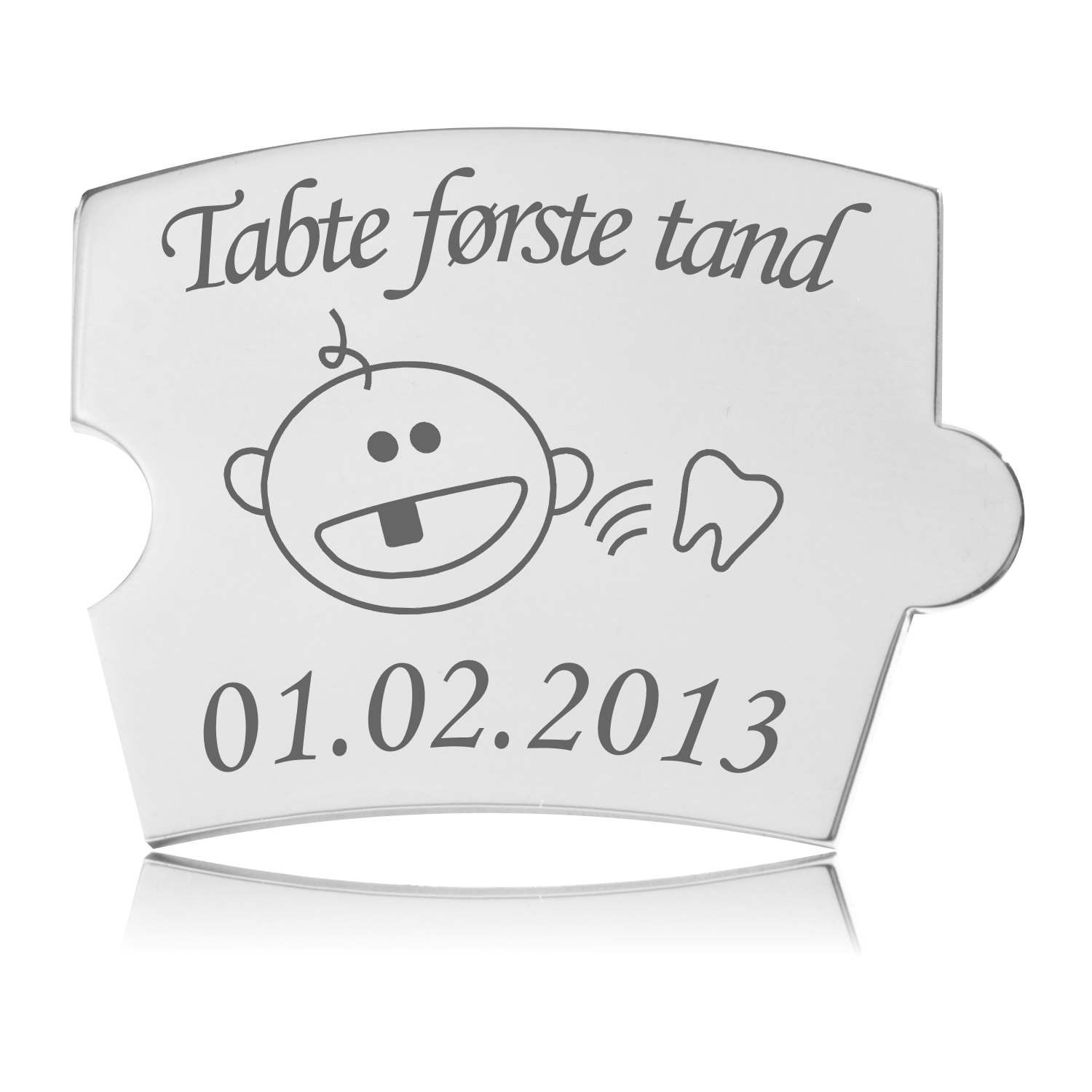 Spin Brik - Tabte første tand Memozz Spin brik i stål med gravering for 'Tabte første tand'. Motivet viser en glad baby med en manglende tand.