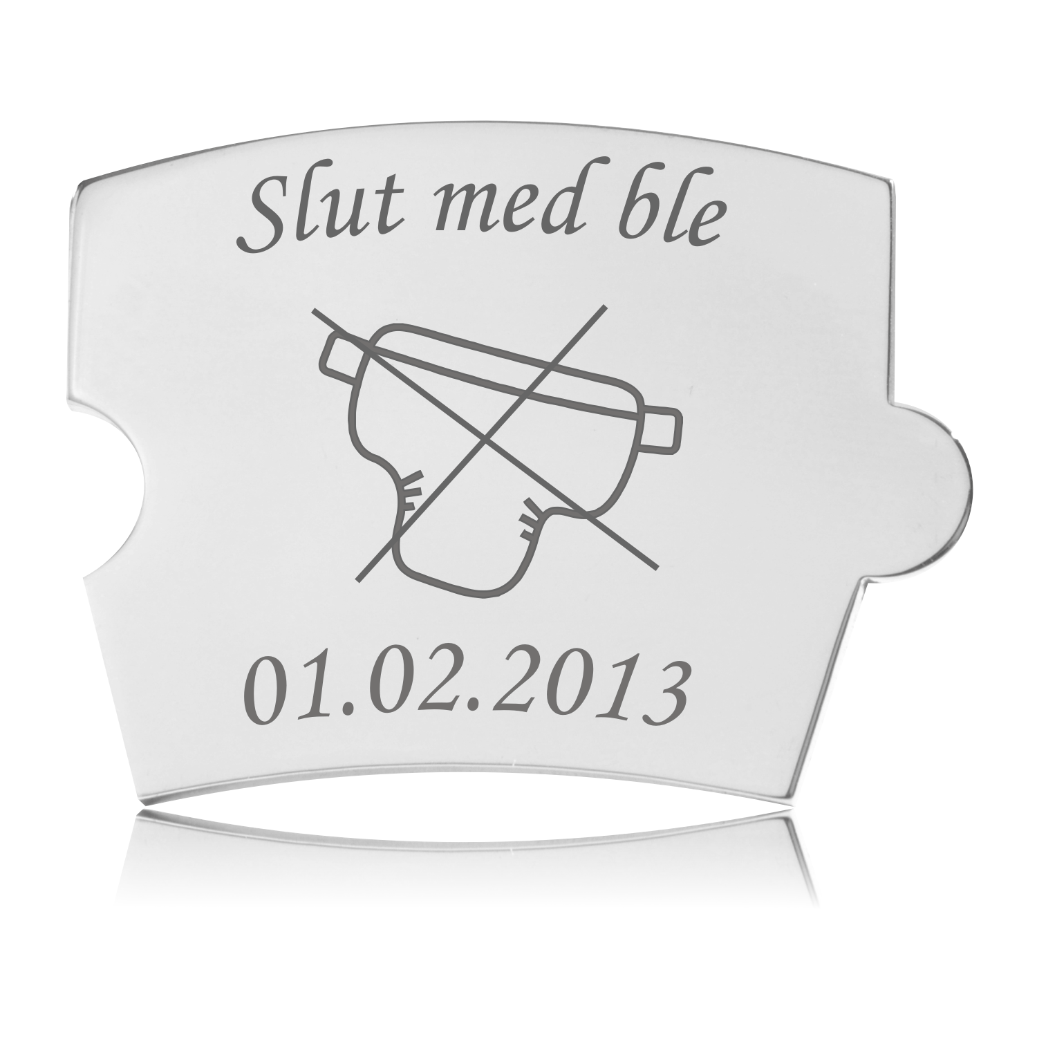 Memozz Spin brik i håndpoleret rustfrit stål med teksten "Slut med ble" og et krydset ble-ikon i mørkegrå lasergravering.