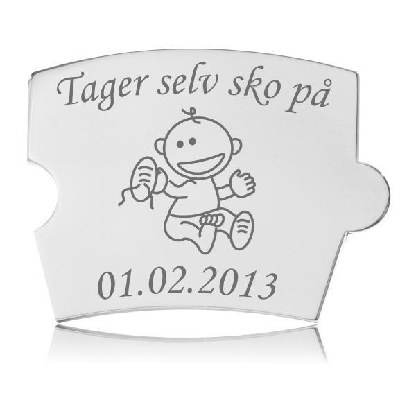 Memozz Spin brik i poleret rustfrit stål med gravering: "Tager selv sko på" og billede af en baby