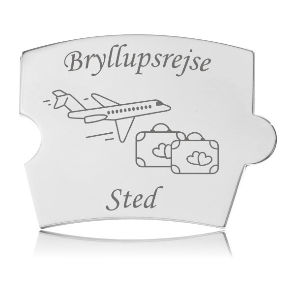Spin Bryllupsrejse Brik i Stål Memozz Spin brik med gravering af fly og kufferter, samt teksten "Bryllupsrejse" og "Sted"