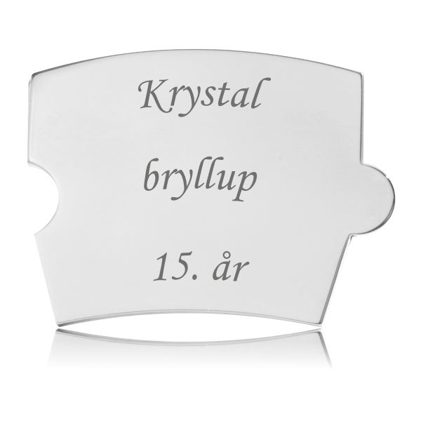 Memozz Spin brik i håndpoleret rustfri stål med graveringen "Krystal bryllup 15. år"